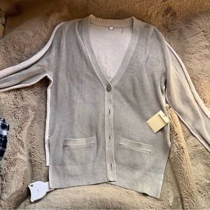 Margaret O’Leary cable knit cardigan.